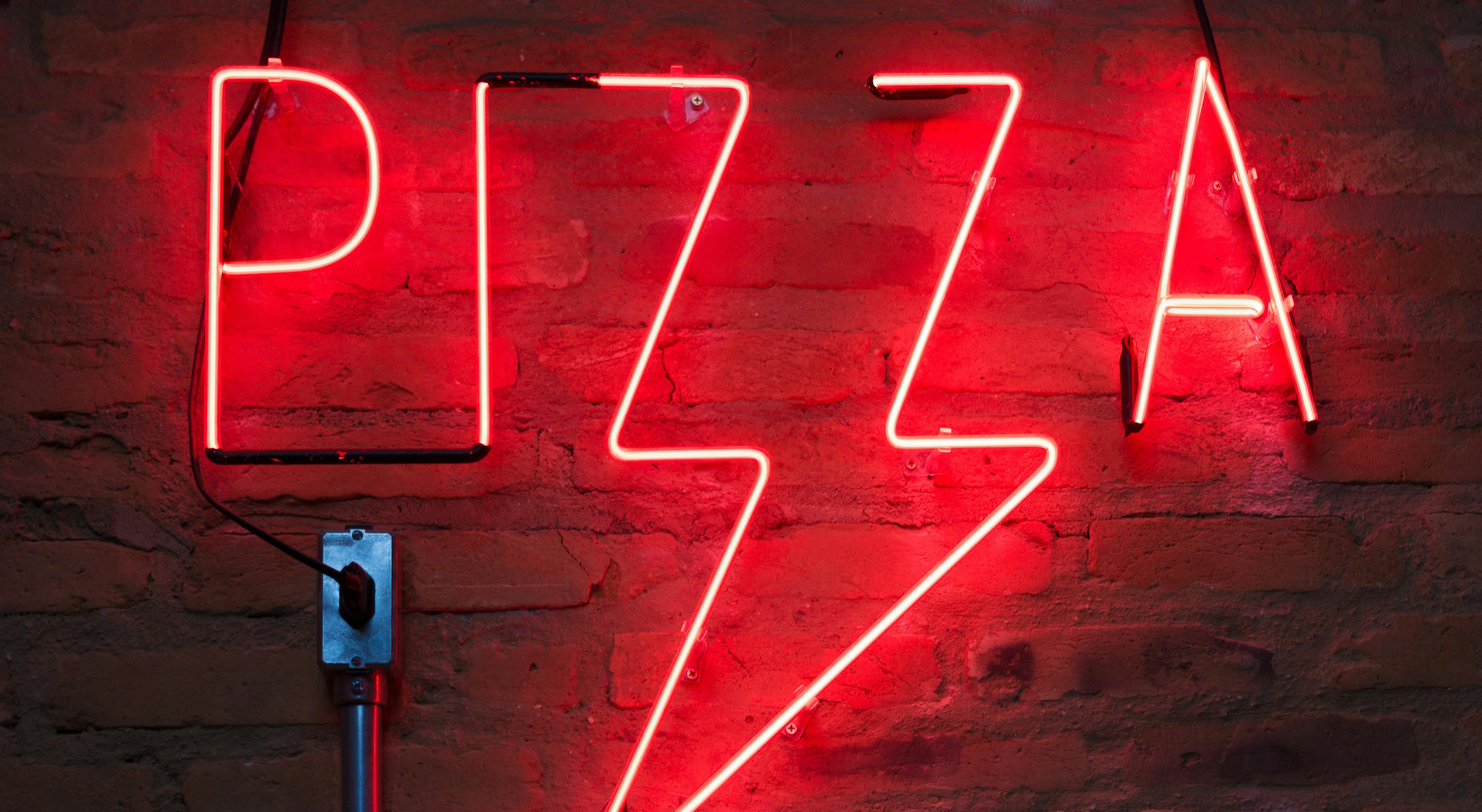 Neon pizza sign