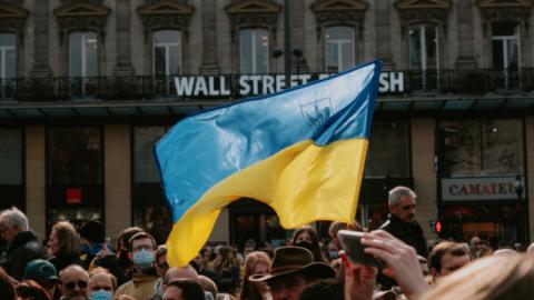 Ukrainian flag waiving during protest.